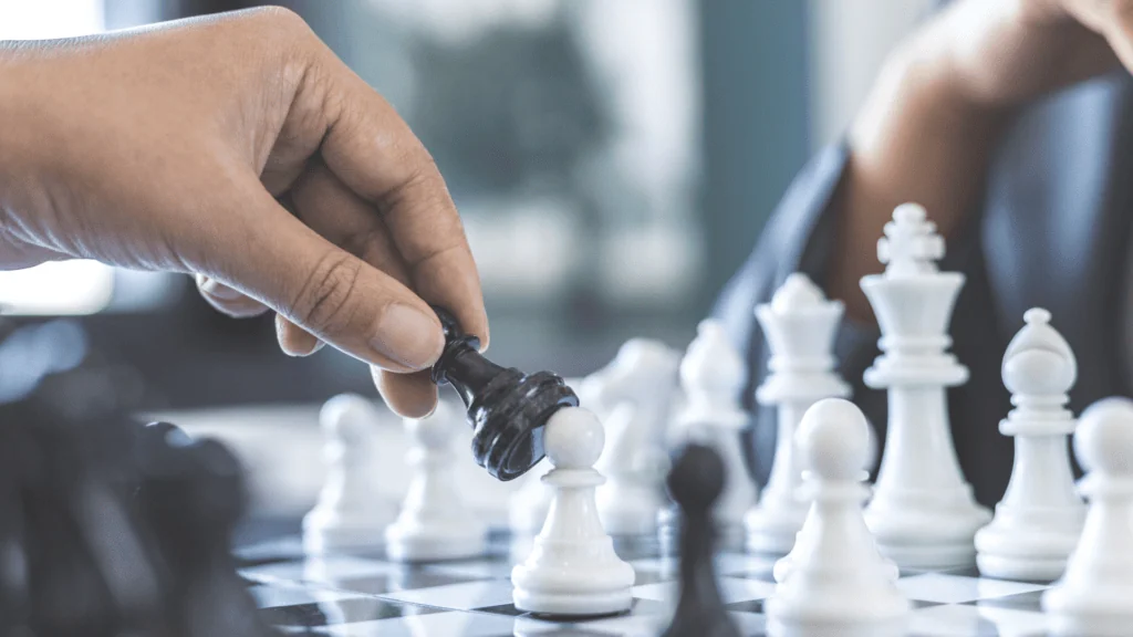 Chess board being played.