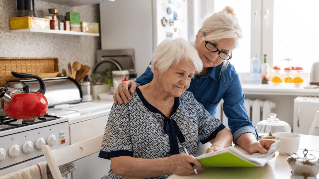 Mother with Daughter reviewing important documents together.