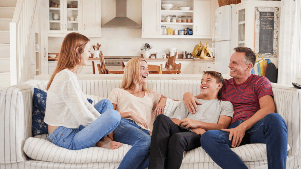 Family of four on a couch.