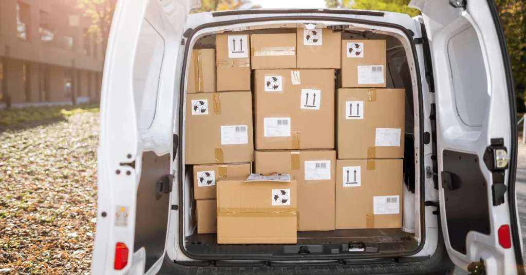 Image of Delivery Van overflowing with parcels.