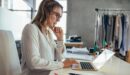 Female business owner making a decision on their laptop.